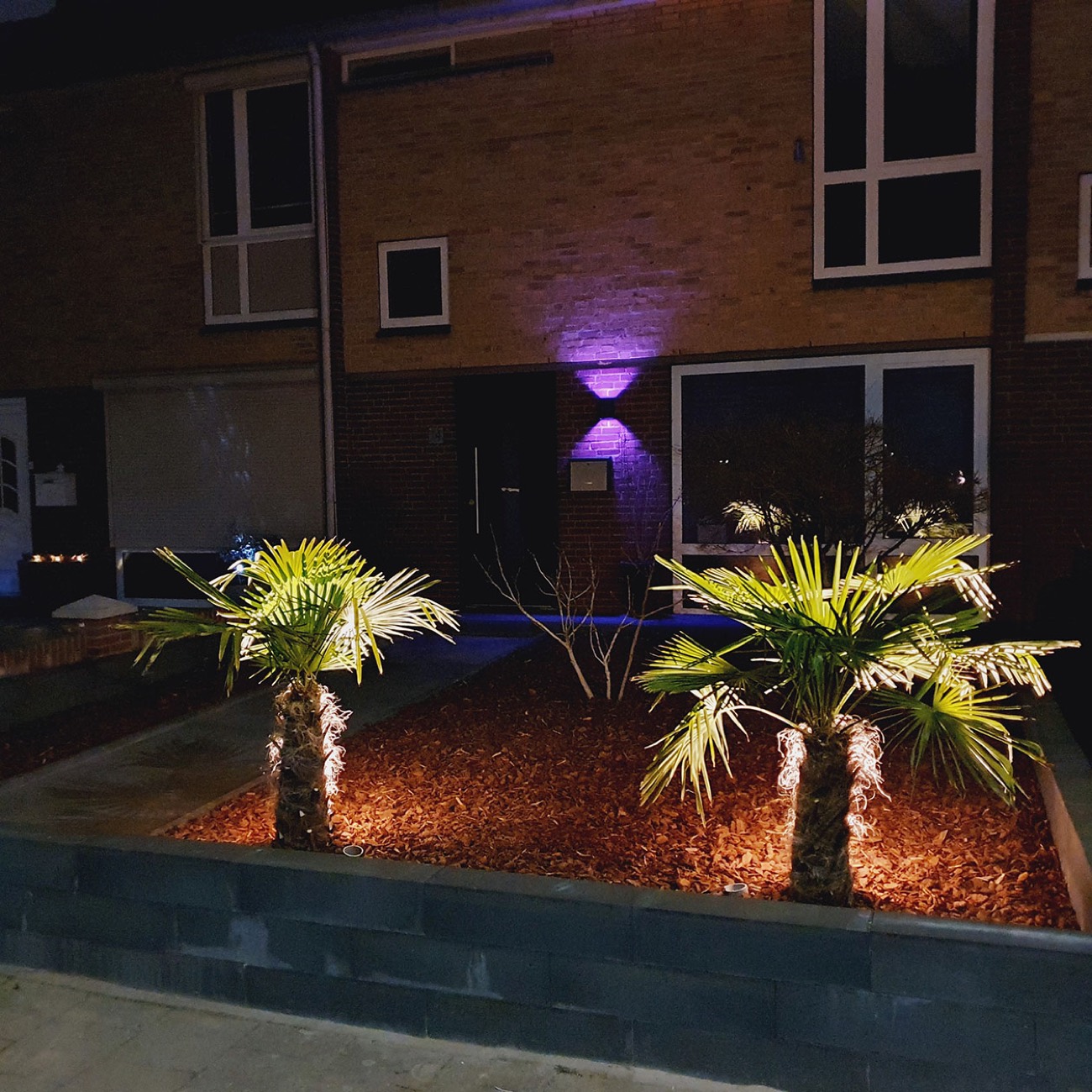 Inrit met sierband en verlichting